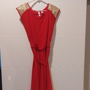 Elegant Red Dress with Gold Accents